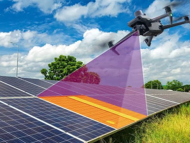 Drone carrying out an inspection over solar panels